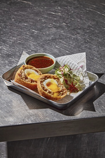 Scotch egg with chilli dip